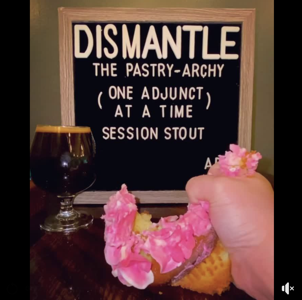 Beer, hand crushing a cupcake, and board displaying beer info