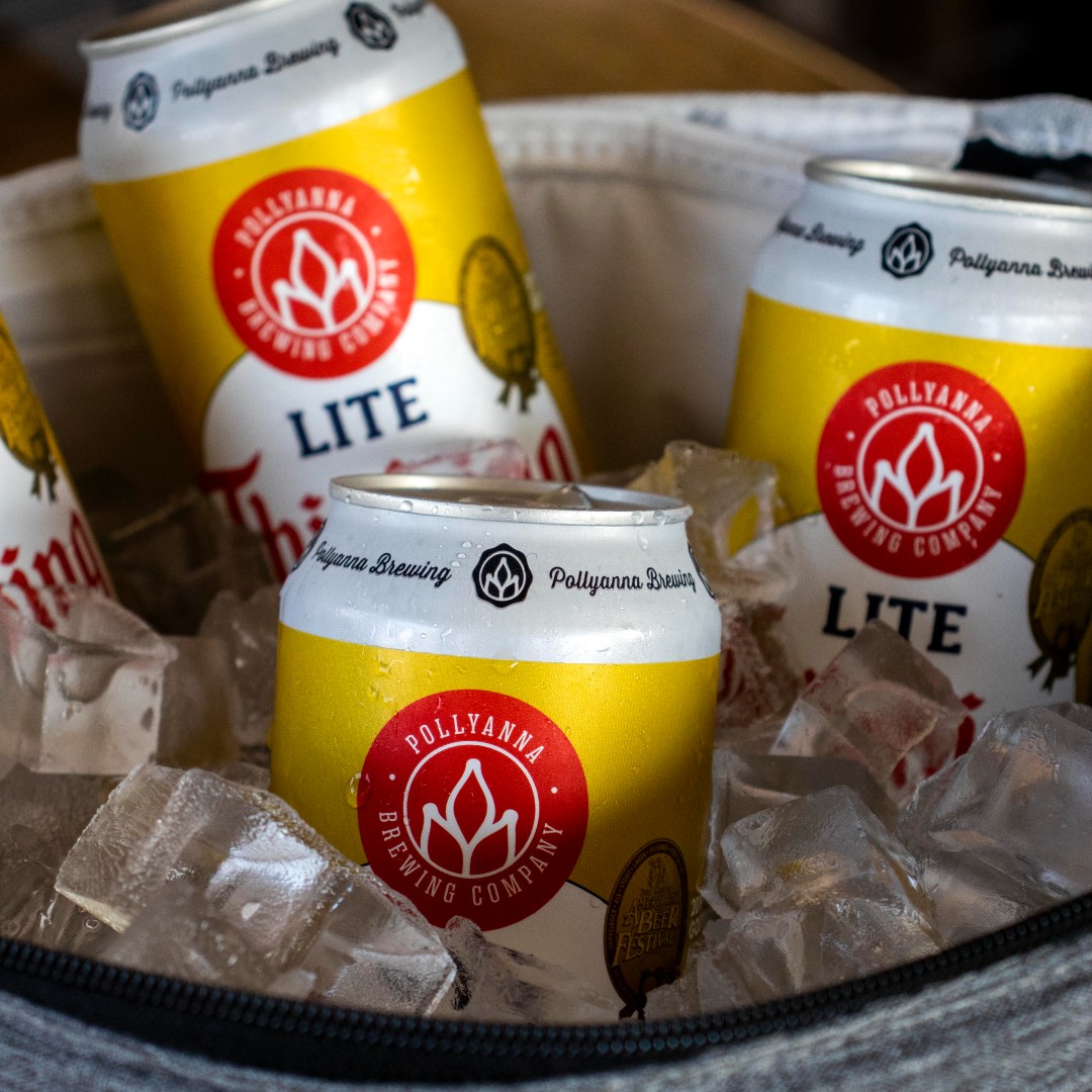 Cans of Lite Thinking in a cooler with ice