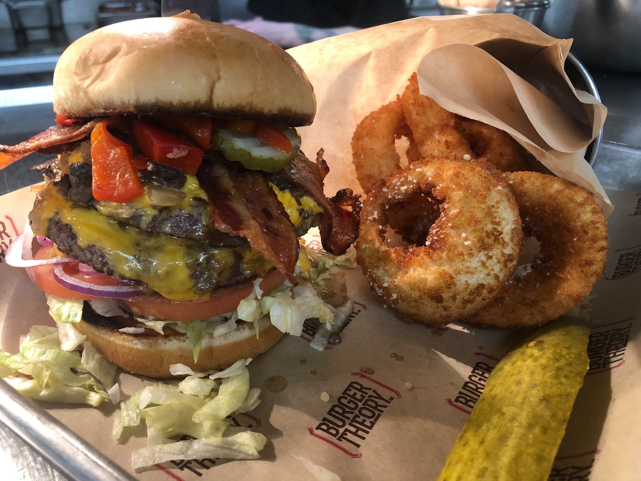 Burger Theory burger with onion rings